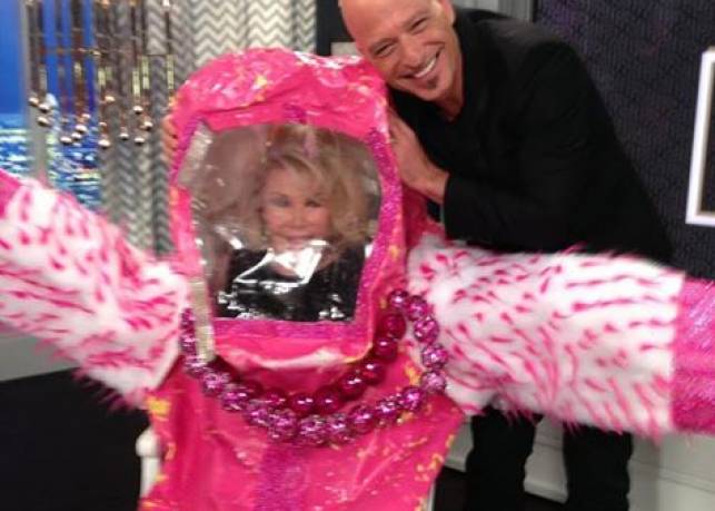 Howie Mandel brings Joan a germ free Birthday Suit with built in jewelry!