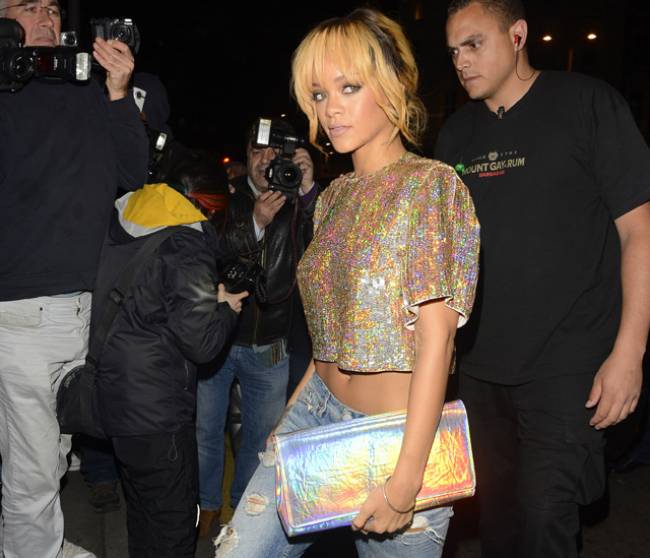 Rihanna in Stella McCartney top and bag.