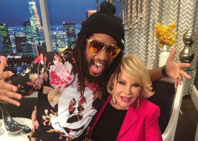 Lil John wears a NEFF shirt and hat with Joan Rivers on Fashion Police