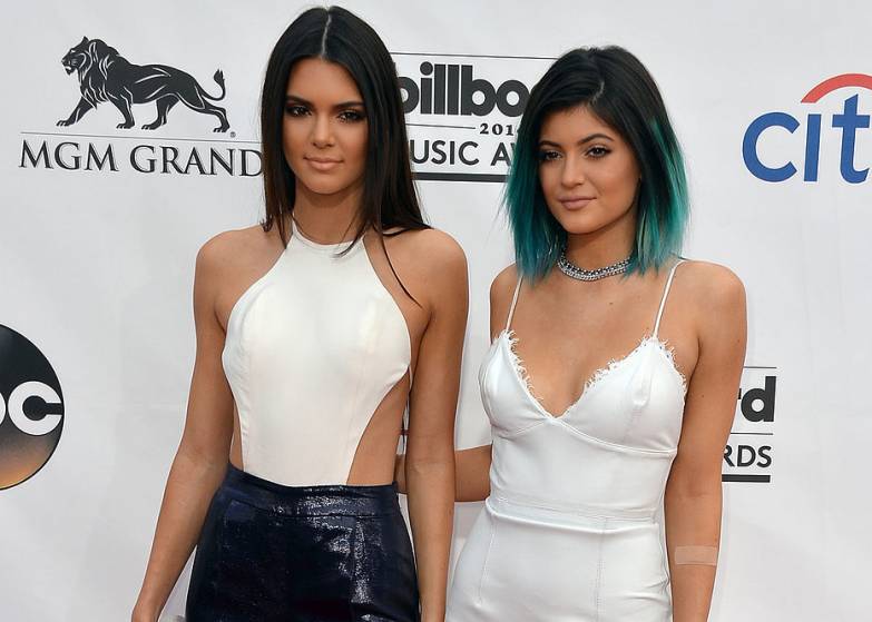 Kendall Jenner was sleek in Olcay Gulsen, while sister Kylie chose Alex Perry and ICe Blue Tips.