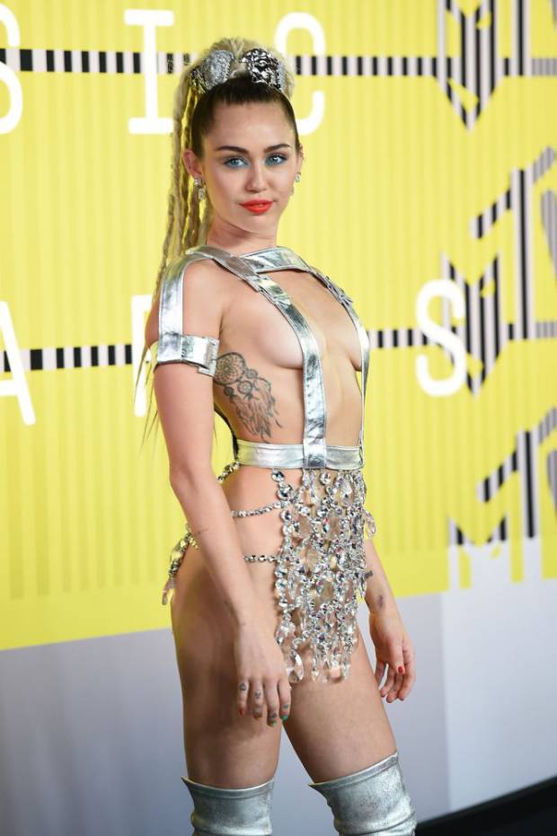 Hostess of VMA's Miley Cyrus in Versace
